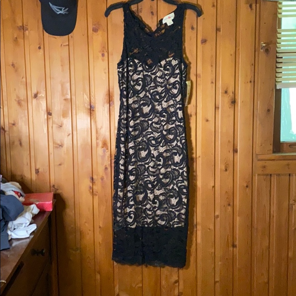 Black lace dress. Mid length